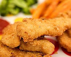 Strips of chicken breast meat, with savory breading... these are our Deluxe Chicken Fingers! 